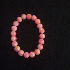 Woman's cute pink beaded bracelet